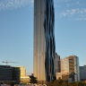 <b>DC Tower 1</b><br/>
Höhe 220 Meter<br/>
Architekt Dominique Perrault<br/>
Eigentümer Vienna DC Tower 1 Liegenschaftsbesitz GmbH<br/>
Nutzfläche 66.000 m<sup>2</sup><br/>
Leerstehende Fläche 20.000 m<sup>2</sup><br/>
Prozent 30,3%